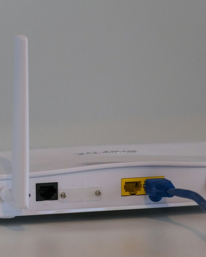 Broadband router with an Ethernet cable plugged in