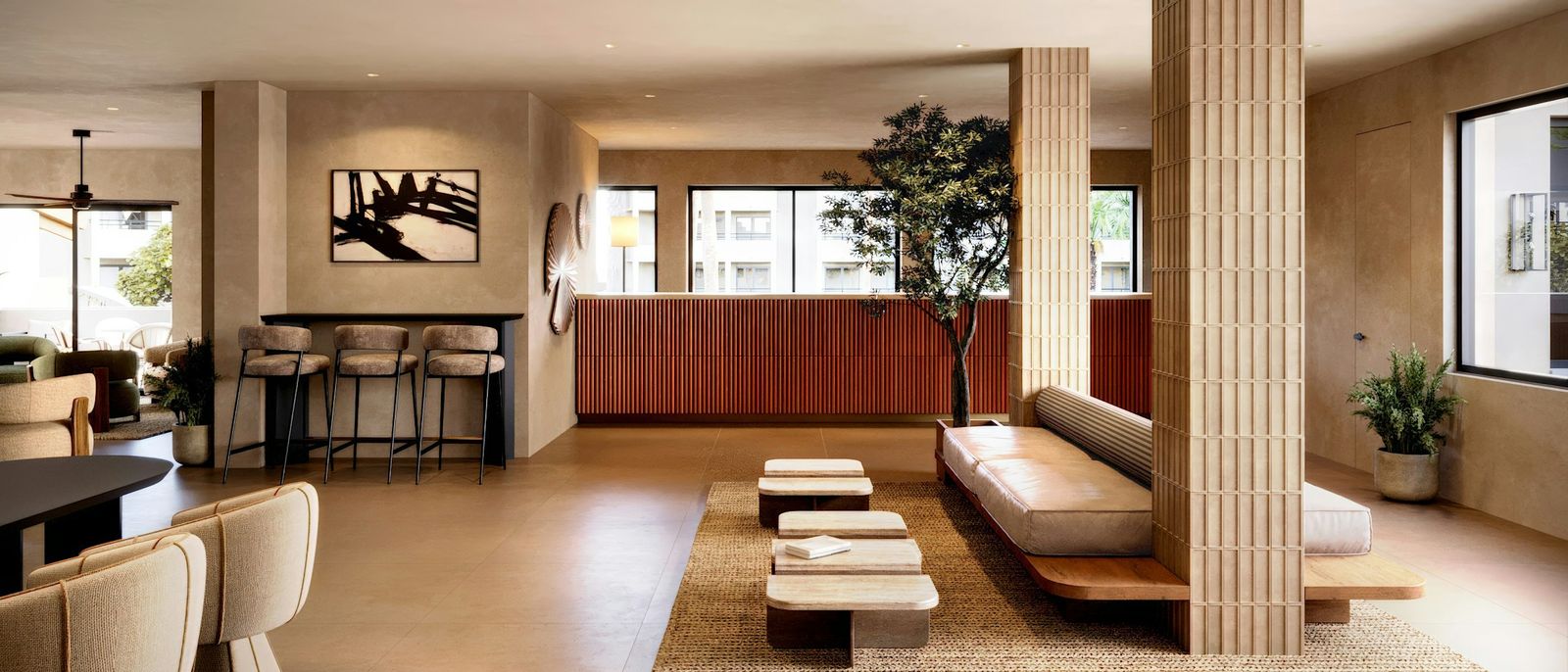 Hotel lobby with lounge seating and a reception desk