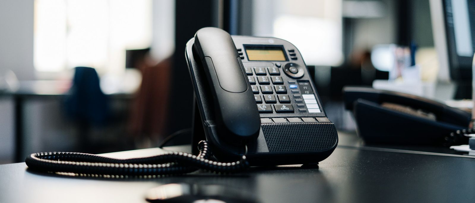 IP desk phone on an office desk