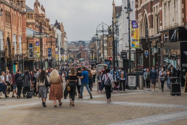 Busy pedestrian high street in a UK city